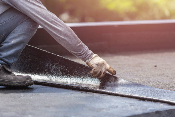 Professional Waterproofing technician working in Burnsville, NC